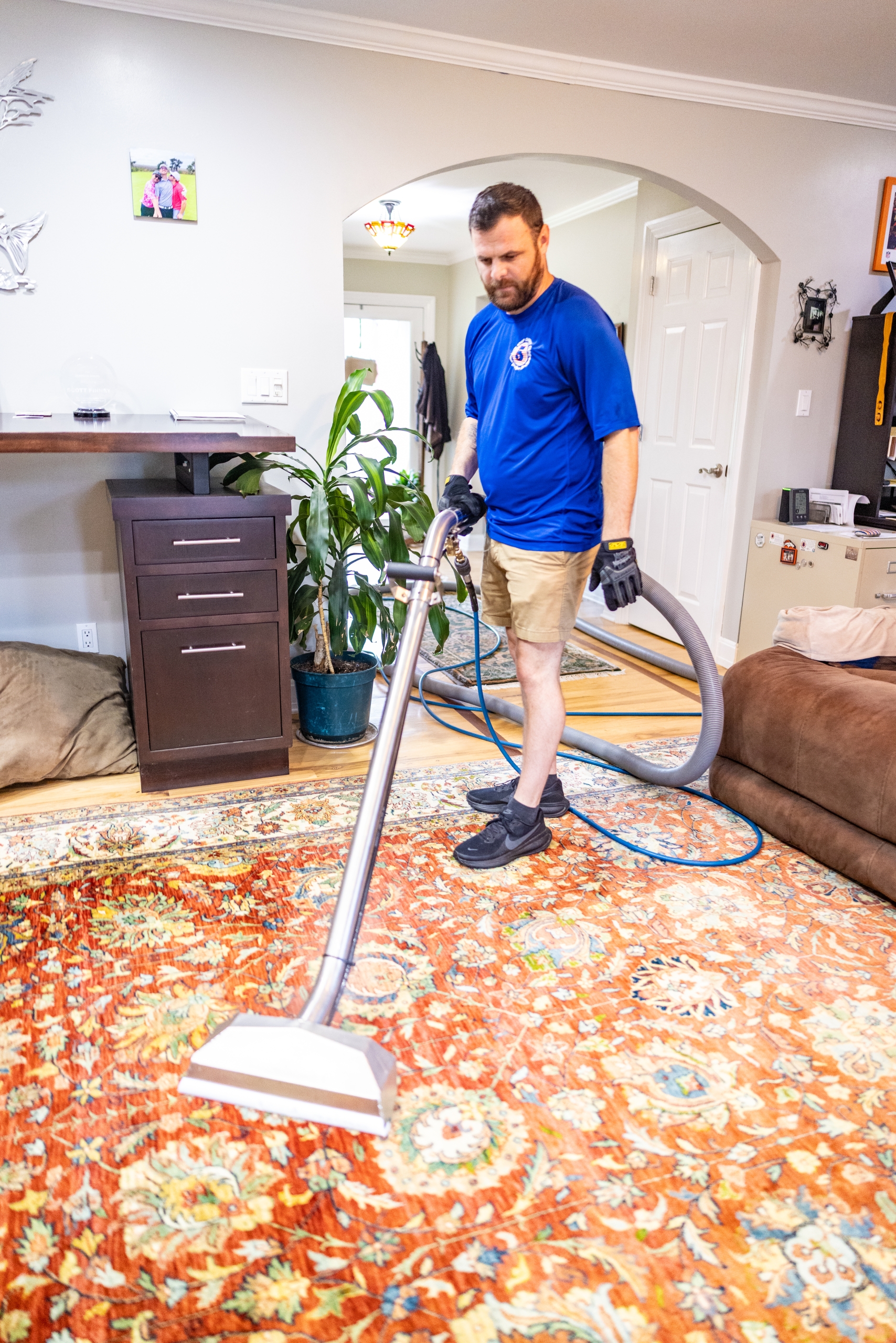 Five Step Carpet Care - 2026 122 Man cleaning large oriental-style rug, carpet and rug cleaning in Asheville NC