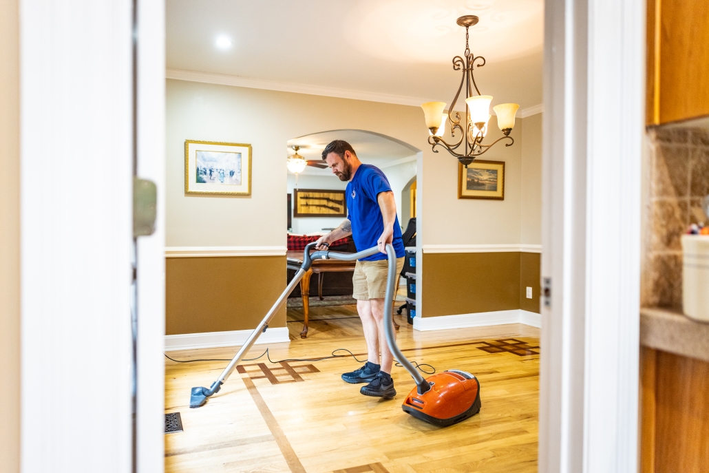 Five Step Carpet Care - 2026 150 Man cleaning hardwood floor, hardwood floor care in Asheville, NC