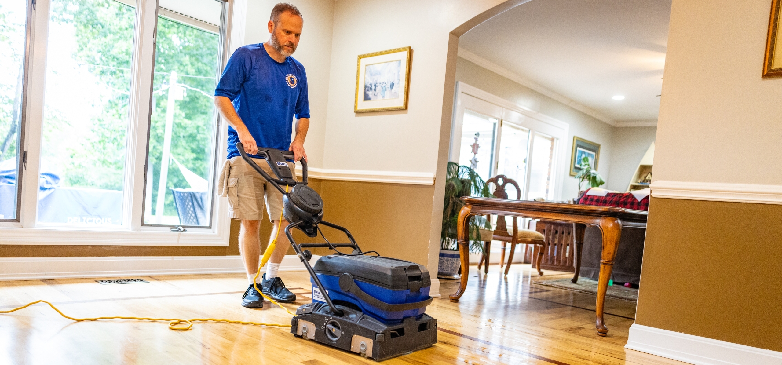 Five Step Carpet Care - 2026 163 Man polishing hardwood floors, carpet care in Asheville NC