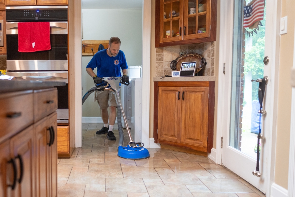 Five Step Carpet Care - 2026 182 Worker polishing tile kitchen floor, tile cleaning in Asheville NC